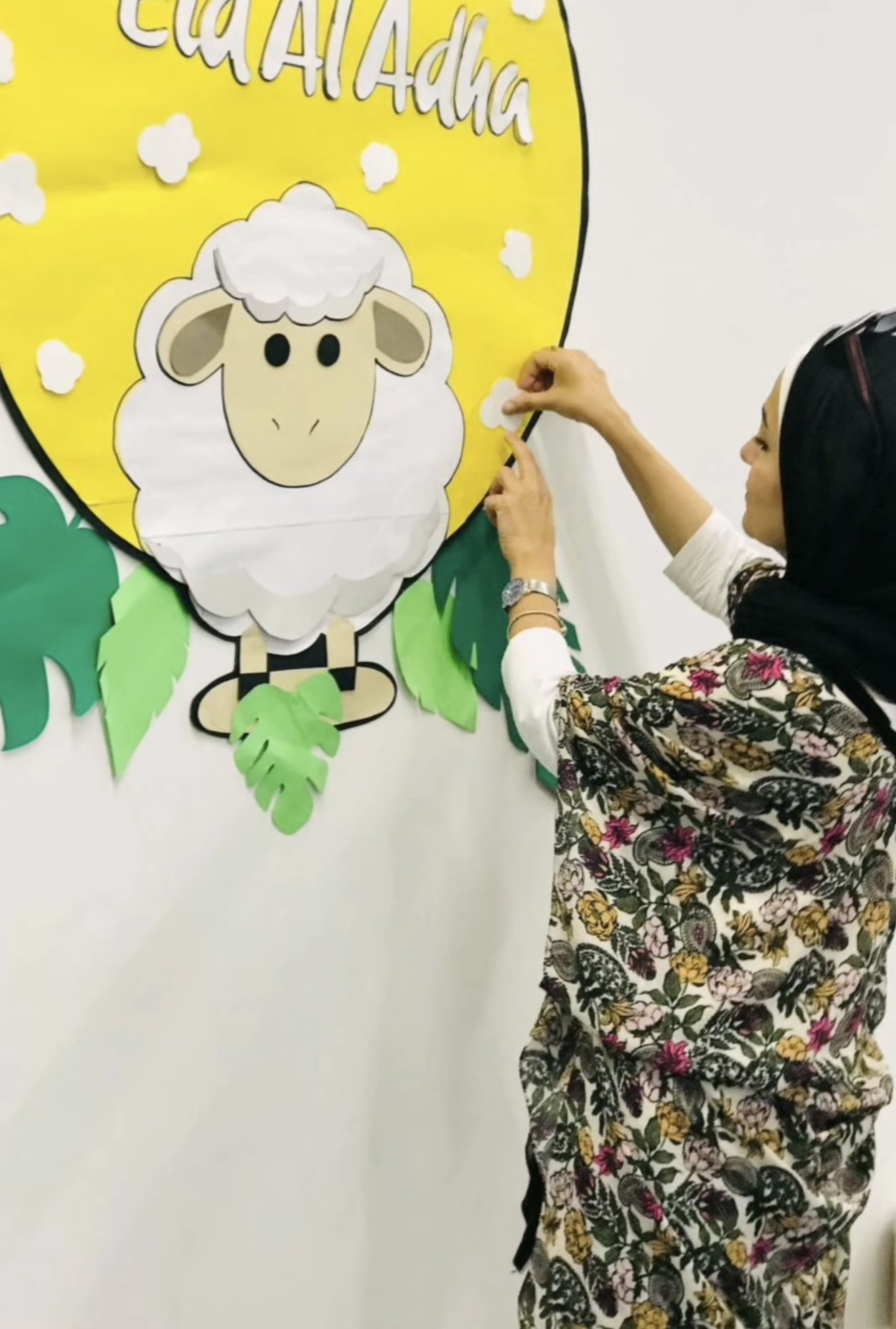 A student at the studio, absorbed in painting a canvas